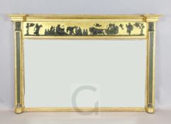 A large Regency parcel ebonised and gilt overmantel, with classical figure frieze and Egyptian