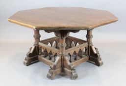 A Victorian gothic revival oak centre table, designed by Collier & Plucknett, Warwick, with plain