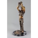 Desmond Fountain (Bermudan, b. 1946). A bronze figure of a young girl holding a teddy bear,