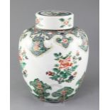 A Chinese famille verte jar and cover, late 19th century, painted with flower sprays and lappeted