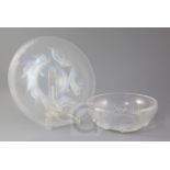 A Rene Lalique Ondines pattern opalescent glass bowl and matching plate or stand, the bowl with