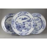 A set of three Chinese export blue and white dishes, Qianlong period, comprising a pair and a larger