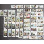 Two folio albums of cigarette cards on the themes of Famous Works of Art, People and Achievements,