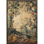 An 18th century Flemish verdure tapestry, woven with a pheasant standing before a grotto and