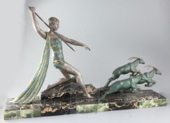 Dauvergne. An Art Deco bronzed spelter group of Diana the Huntress with three gazelles, 33.5in.