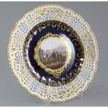 A Meissen cabinet plate, late 19th century, finely painted to the centre with an equestrian scene