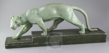 Ouline. An Art Deco bronzed terracotta model of a panther, length 28in.