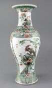 A Chinese famille verte vase, late 19th century, painted with a phoenix amid rockwork and flowers,