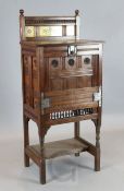 Attributed to Charles Lock Eastlake. A Victorian Aesthetic movement walnut writing desk, with tile