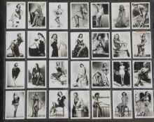 Three folio albums of cigarette cards on the themes of Entertainment Stars, Beauties and Famous