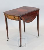 A George III inlaid mahogany and satinwood Pembroke table, the oval top inlaid with a central oval