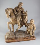 A 16th century South Netherlands oak carving of St Martin and the beggar, St Martin depicted