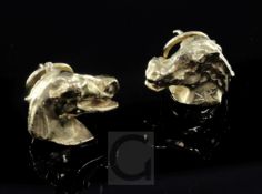 A pair of 1990's 18ct gold earrings, modelled after Dali's Laughing Horse Head, in original box,