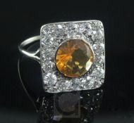 A white gold, fire opal and diamond square cluster ring, size L.