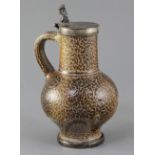 A 17th century saltglazed Rheinish tigerware flagon, with later plated hinged cover 21cm