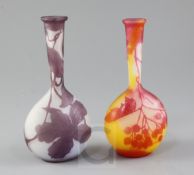 Two small Galle cameo glass bottle vases, c.1900, both decorated with flowering branches; the