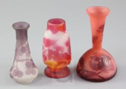 Three small Galle two-colour cameo glass vases, c.1900, each decorated with berries or flower and