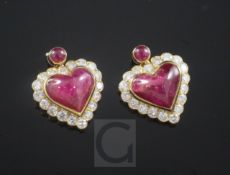 A pair of gold, ruby and diamond set heart shaped earrings, unmarked, 20mm.