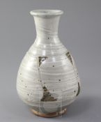 Bernard Leach (1887-1979). A bottle shaped vase, the celadon-grey vase with white slip trailing rust