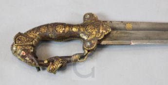 A fine Indian sword tulwar, late 19th century, the iron hilt with elephant's head pommel and tiger