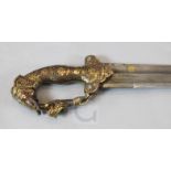 A fine Indian sword tulwar, late 19th century, the iron hilt with elephant's head pommel and tiger