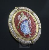 A 19th century gilt metal mounted oval micro mosaic brooch, decorated with a full length portrait of