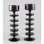 Ronald Stennett-Willson for Wedgwood. Two Sheringham five disc amethyst glass candlesticks, 22.5cm