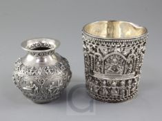 In Indian white metal beaker, with cast mount depicting Lord Shiva within a shrine and bands of