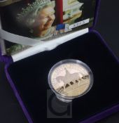 A cased Royal Mint 2002 gold proof H.M. The Queen Golden Jubilee £5 crown, no. 3205/5502