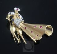 A gold, ruby, sapphire and diamond set novelty clip brooch, modelled as a Matador, gross 16.3 grams,