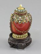 A Chinese faux chalcedony glass gilt metal and gem set snuff bottle and stopper, late 19th / early