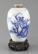 A Chinese blue and white ovoid jar, Transitional period c.1640, painted with birds in flight,