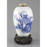 A Chinese blue and white ovoid jar, Transitional period c.1640, painted with birds in flight,