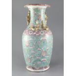 A large Chinese Canton decorated turquoise ground two-handled vase, late 19th century, painted