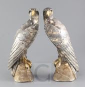 Frederick Benjamin Francis (1884-1959). A pair of 1930's coloured marble models of falcons, 12in.