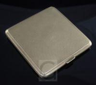 A 1920's engine turned 9ct gold square cigarette case, with engraved monogram, Thomas William