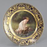 A Vienna style cabinet plate, c.1900, painted to the century with 'Psyche am Wasser', signed by