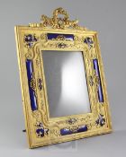 An early 20th century French blue enamel and ormolu photograph frame, of ornate design, with