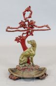 A Victorian painted cast iron 'Cavé Canem' stick stand, W.1ft 6in. H.2ft 5in.
