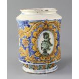 A Montelupo maiolica albarello, 18th century, painted with an oval reserve of a bust of a Roman