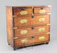 A Regency miniature brass inset mahogany campaign chest, with two short and three long drawers,