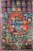 A Tibetan painted silk thangka, 19th century, painted with the figure of Mahakala, and multiple of