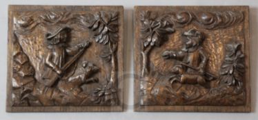 A pair of 18th century carved oak panels, depicting hunters holding muskets, with dogs at foot, 8