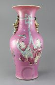 A large Chinese pink ground vase, late 19th century, painted with the He He Erxian holding a