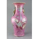 A large Chinese pink ground vase, late 19th century, painted with the He He Erxian holding a