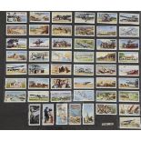 Four folio albums of cigarette cards on topographical themes, Buildings, Monuments, etc., mainly