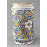 A Montelupo maiolica albarello, 18th century, polychrome painted with flowers and foliage on a