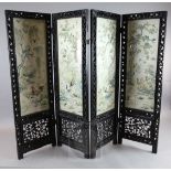 A Chinese 'Hundred Birds' embroidered four-fold screen, early 20th century, each panel with an ivory