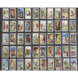 A folio album of cigarette cards on various themes, including Stories, Proverbs, Humour,