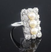 An Art Deco white gold, diamond and cultured pearl rectangular tablet ring, with three central